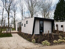 Modern Chalet by the River Maas
