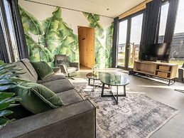 Modern Chalet by the River Maas