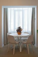 Top-Floor Romanian Athenae 2BR Apartment, Quiet City Views