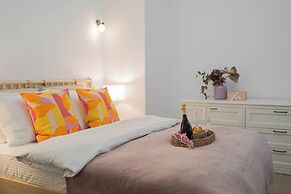 Top-Floor Romanian Athenae 2BR Apartment, Quiet City Views