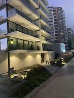AT HOME El Golf