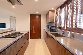 Tau Residences