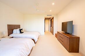 Tau Residences
