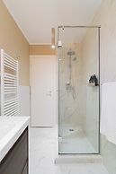 Designer 2-Bedroom Flat with Balcony & Full Amenities Steps from Piata