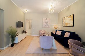 Designer 2-Bedroom Flat with Balcony & Full Amenities Steps from Piata