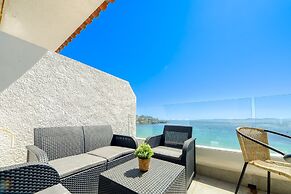 Beachfront Apartment in Platja Almadrava