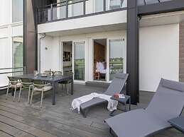 Lush Apartment With Water Views