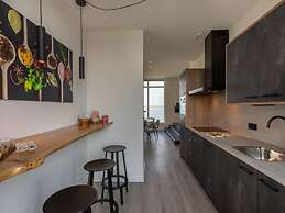 Lush Apartment With Water Views