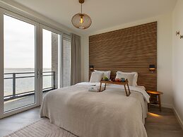 Lush Apartment With Water Views