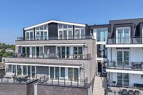Lush Apartment With Water Views