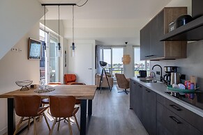 Lush Apartment With Water Views