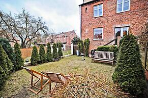 Secret Garden by Grand Apartments
