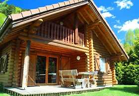 L'ours Blanc Chalet en Rondins