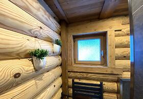 L'ours Blanc Chalet en Rondins