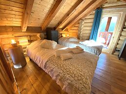L'ours Blanc Chalet en Rondins