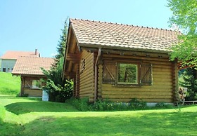 L'ours Blanc Chalet en Rondins