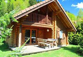 L'ours Blanc Chalet en Rondins