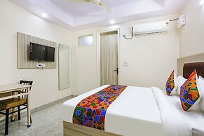 Fabhotel Taugan Inn