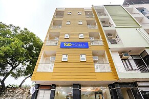 Fabhotel Taugan Inn
