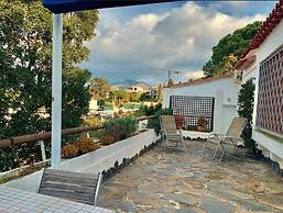 House in Roses With Waterfront Views