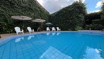 La Posada Del Cauchero Hotel & Suites