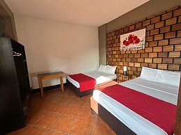 La Posada Del Cauchero Hotel & Suites