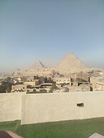 Isis pyramids view inn