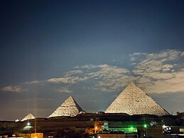 Isis pyramids view inn