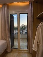 Isis pyramids view inn