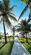 NEW Stunning Beachfront Condo at the Coral Beach