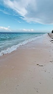 NEW Stunning Beachfront Condo at the Coral Beach