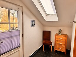Ferienhaus mit Kaminofen in Burhave