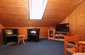 Ferienhaus mit Kaminofen in Burhave