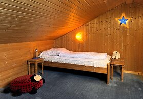 Ferienhaus mit Kaminofen in Burhave