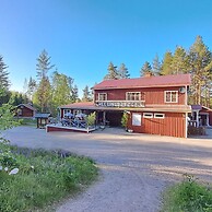 Skålsjögården Timber Lodge