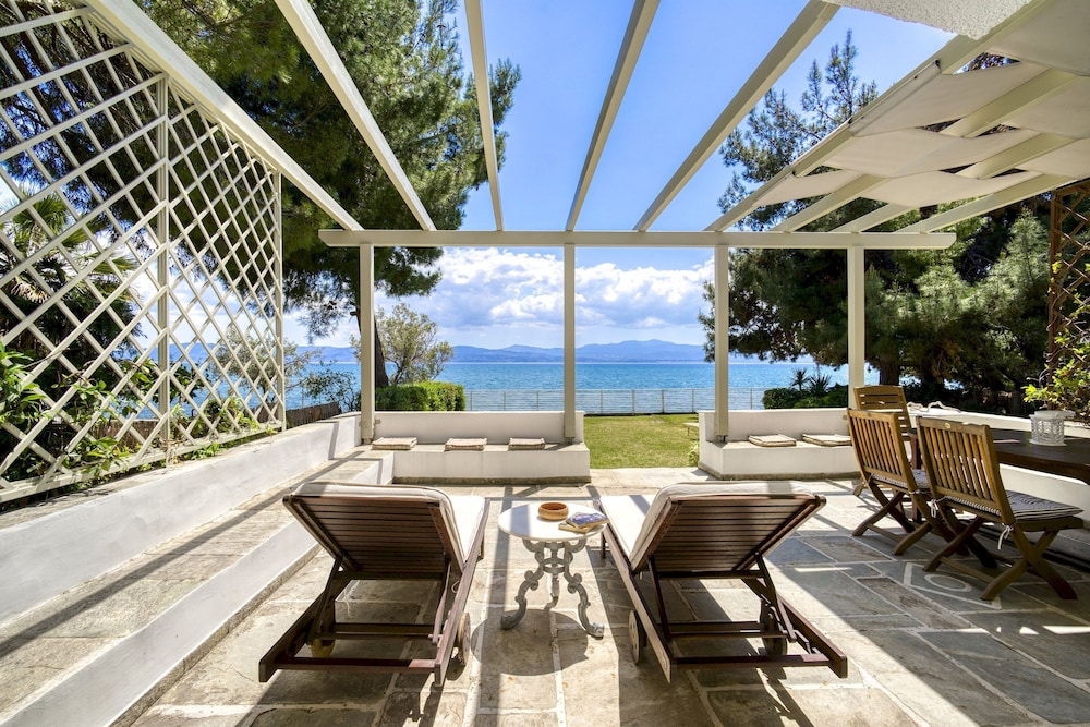 Salt Stone Beach Front Retreat by Estia
