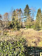 Maison proche rivière avec jardin