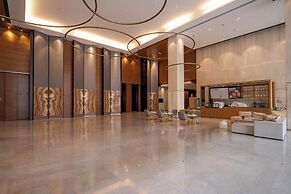 Xingyi Chain Hotel Jiangxia Metro Station