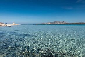 A few Steps La Pelosa Beach