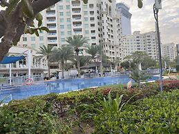 Palm Living 2BR Maid w Pool Beach Access