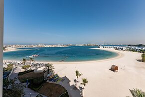 Palm Living 2BR Maid w Pool Beach Access