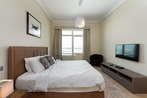 Palm Living 2BR Maid w Pool Beach Access