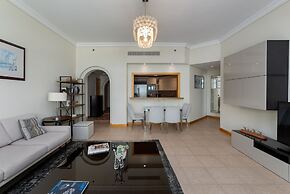 Palm Living 2BR Maid w Pool Beach Access