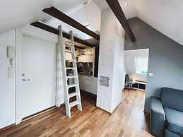 Apartment With Loft and Window Balcony