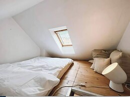 Apartment With Loft and Window Balcony