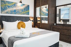 Aina Residency Beachfront Hotel