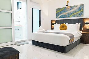 Aina Residency Beachfront Hotel