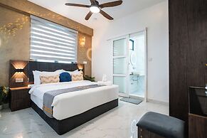 Aina Residency Beachfront Hotel