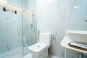 Aina Residency Beachfront Hotel