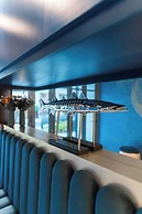 Aina Residency Beachfront Hotel
